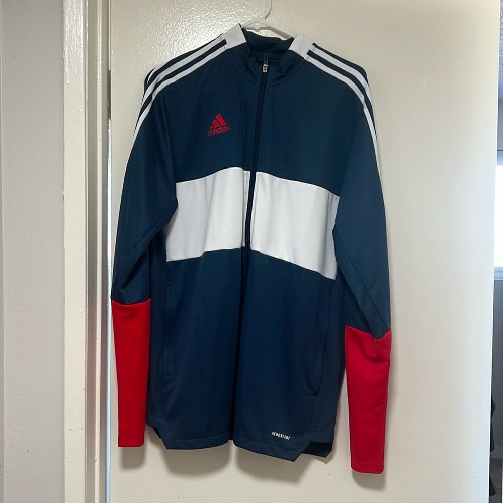Adidas Sport Jacket for men size L
New with no tag